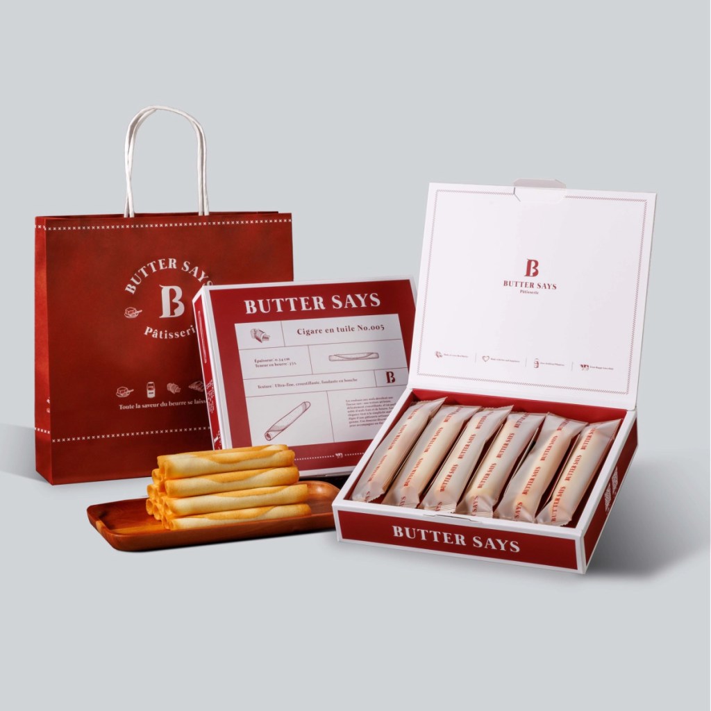 ButterSays人氣商品「海鹽芝士雪茄捲禮盒」（12入／售價450元），以層層薄脆餅皮包裹濃郁芝士香氣，再以海鹽點綴整體風味，讓甜與鹹取得恰到好處的平衡，每支獨立包裝，封存剛出爐般的口感輕盈酥脆。(圖／ ButterSays 提供)