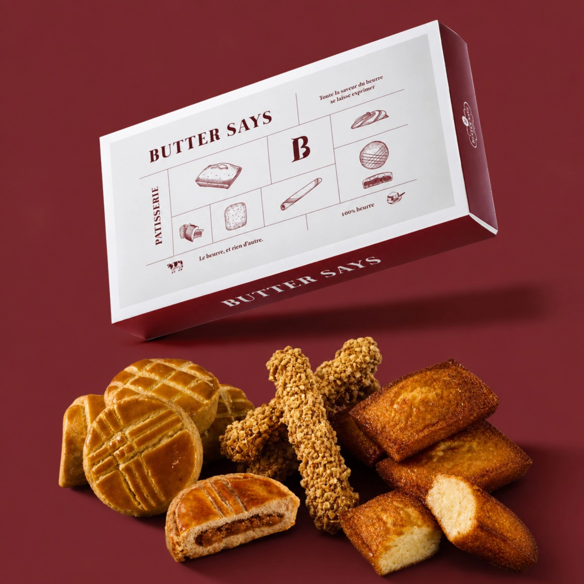 ButterSays「法式綜合禮盒」（12入／售價780元），一次集結艾許奶油費南雪、布列塔尼鳳梨酥及杏仁脆脆三款人氣商品。(圖／ ButterSays 提供)